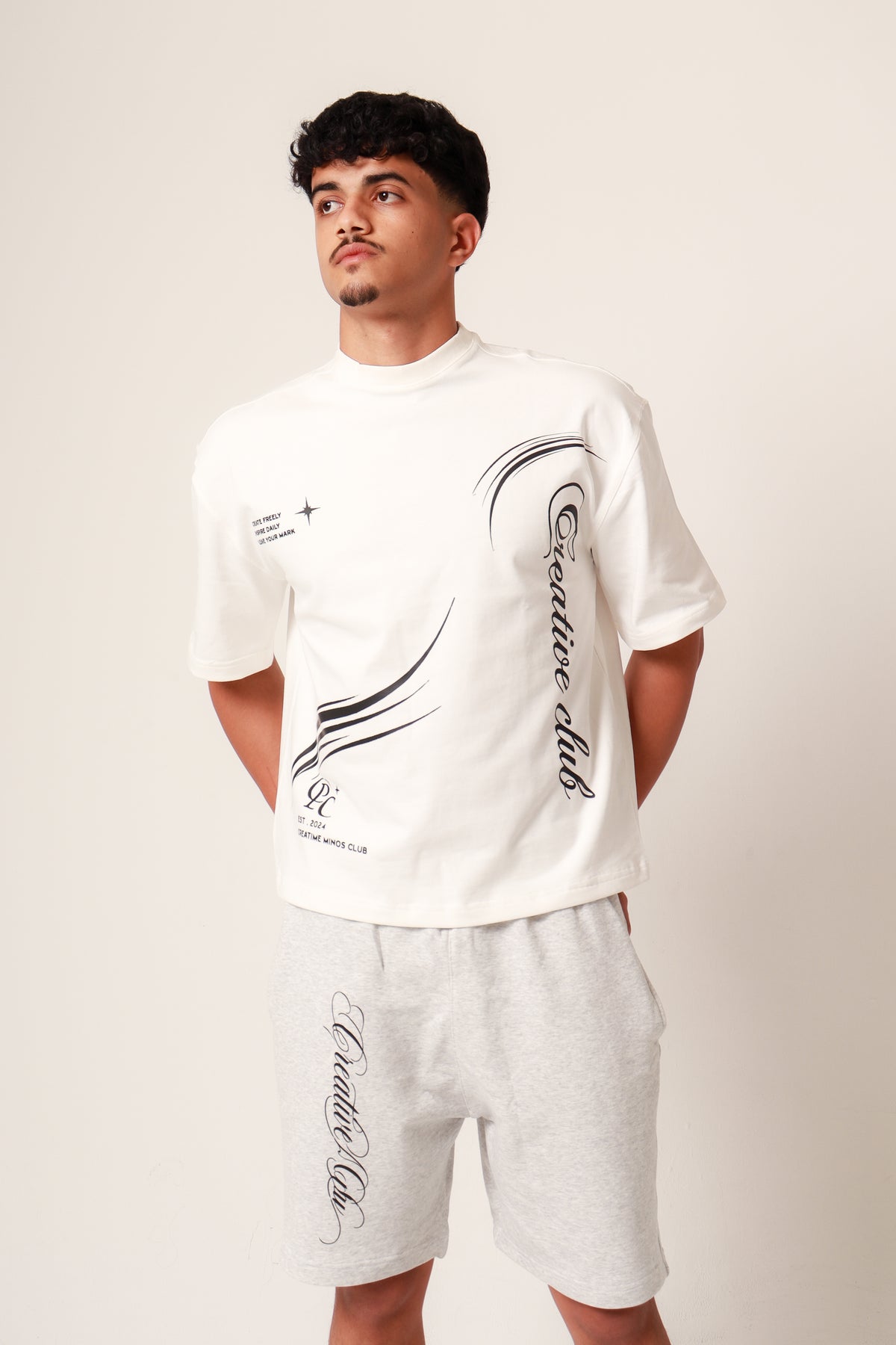 White creative club tee